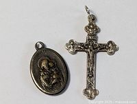 Both pendants side by side on white background