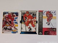 Fronts of all three Fedorov cards side by side