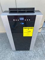 Front view of ARC-14S unit showing control panel, energy guide label