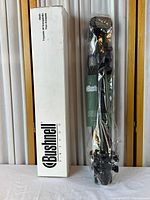 Bushnell tripod sealed in plastic next to original box