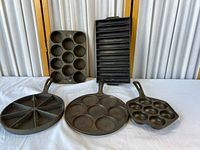 All five cast iron pans displayed