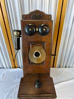 Front view showing bells, mouthpiece housing, receiver and crank