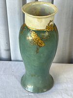 Full view of vase front showing color, shape, decoration