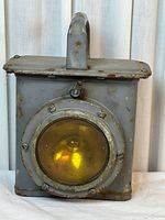 Front view showing amber lens and handle