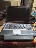 Front view of Dell Latitude D630 laptop opened on table
