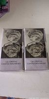 two original boxes marked 2-pc crystal candle holder set
