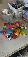 overview of assorted toys spread on table