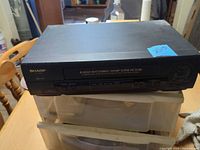 Front angled view of Sharp VC-H800 VCR showing overall condition