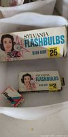 Sylvania Press 25 Blue Dot flashbulbs box, M2 Blue Dot box, small Sylvania Flash box in plastic bin