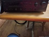 Front view showing model, controls, headphone jack