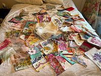 Wide view of entire collection spread on bed
