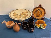 Group view of all eight pottery items
