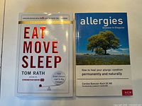 Front covers of both paperback books showing titles and authors