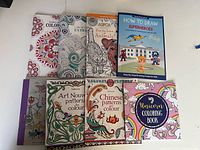 Front covers of all colouring books in the lot