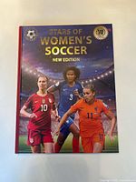 Front cover of the hardcover book showing title and player images