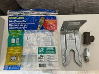 All items: packaged gas connector, steel bracket, elbow, adapter