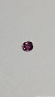Front view of cushion cut pink-purple sapphire