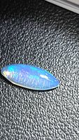 Full view of marquise opal showing blue flash
