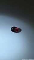 Front view of loose oval ruby