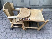 Convertible high chair folded into table and chair configuration, full view