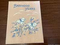 Front cover of Babyhood Years memory book