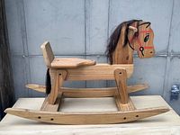 Full side view showing entire rocking horse structure