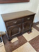 Front view of sideboard showing drawers and doors