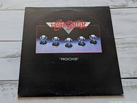 Front album jacket showing artwork and title