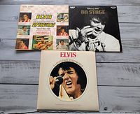 Front jackets of all three Elvis Presley albums