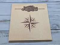 Front cover with compass design