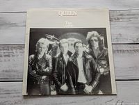 Front outer jacket showing album title and band photo