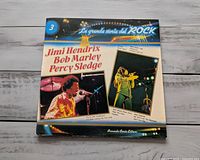 Front cover showing title, volume number, featured artists' names and photos