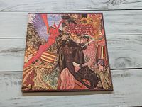 Front cover artwork of Santana Abraxas gatefold LP