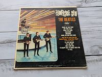 Front album jacket with title, band photo and Capitol logo