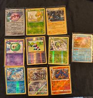 All ten reverse-holo Pokémon cards laid out for full visibility