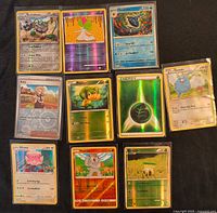 All ten Pokémon cards laid out in two columns