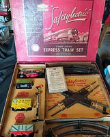 Set in opened box showing all components