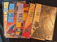 Front view of five bagged First Comics Crossroads trade paperbacks
