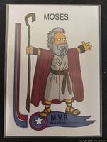 Front of Simpsons Moses trading card showing character artwork and banner