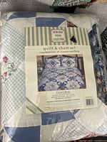 Front of sealed package showing label and quilt pattern