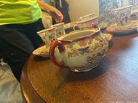 Sugar bowl front view with pattern and missing lid visible