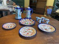 Full set laid out on table showing all 10 pieces