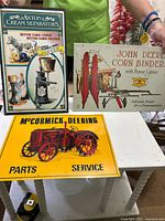 Front view of McCormick Deering Parts & Service sign showing full graphic and text