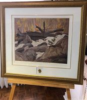 Full view of framed A.J. Casson limited edition print on easel