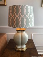 Front view of celadon Ethan Allen lamp with shade