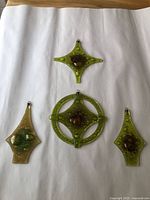 All four fused glass pendants on white background