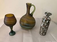 Three items together: Hebron goblet, Hebron handled vase, studio pottery vase