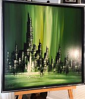 Full view of framed abstract painting on easel