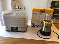 Bella blender and Hamilton Beach dehydrator side by side