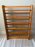 Front view showing six-tier pine shelf